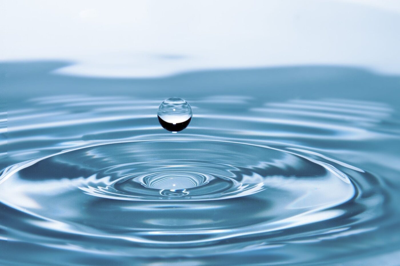 A drop of water with a ripple below