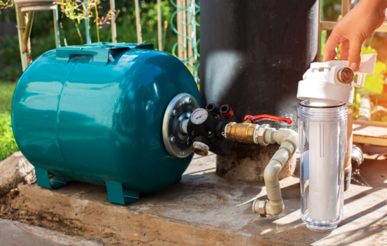 Well water treatment system, filter, and well tank
