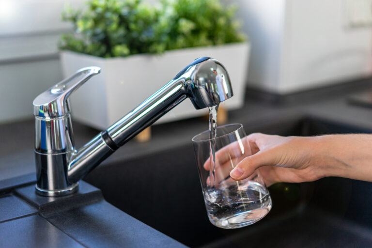 Filling glass of water from the tap